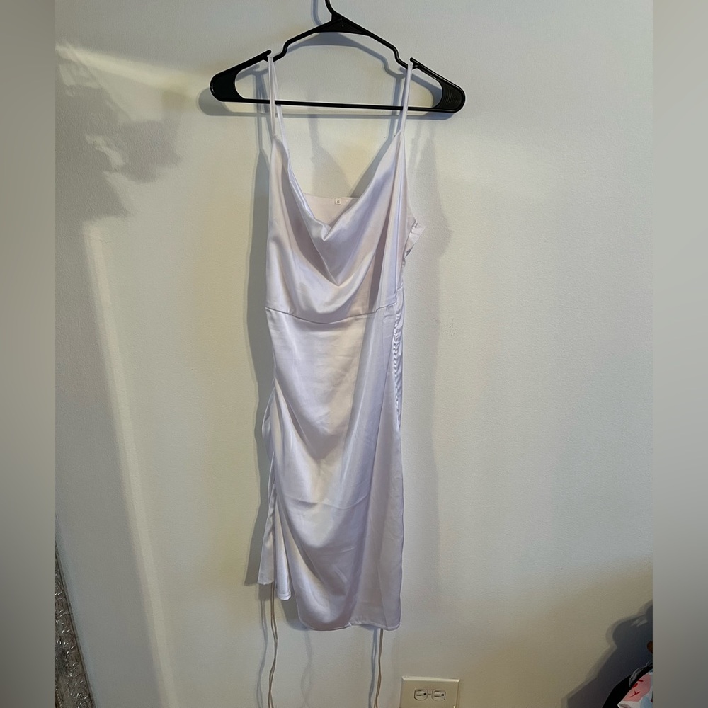 White dress with adjustable skirt & cowl neck top.